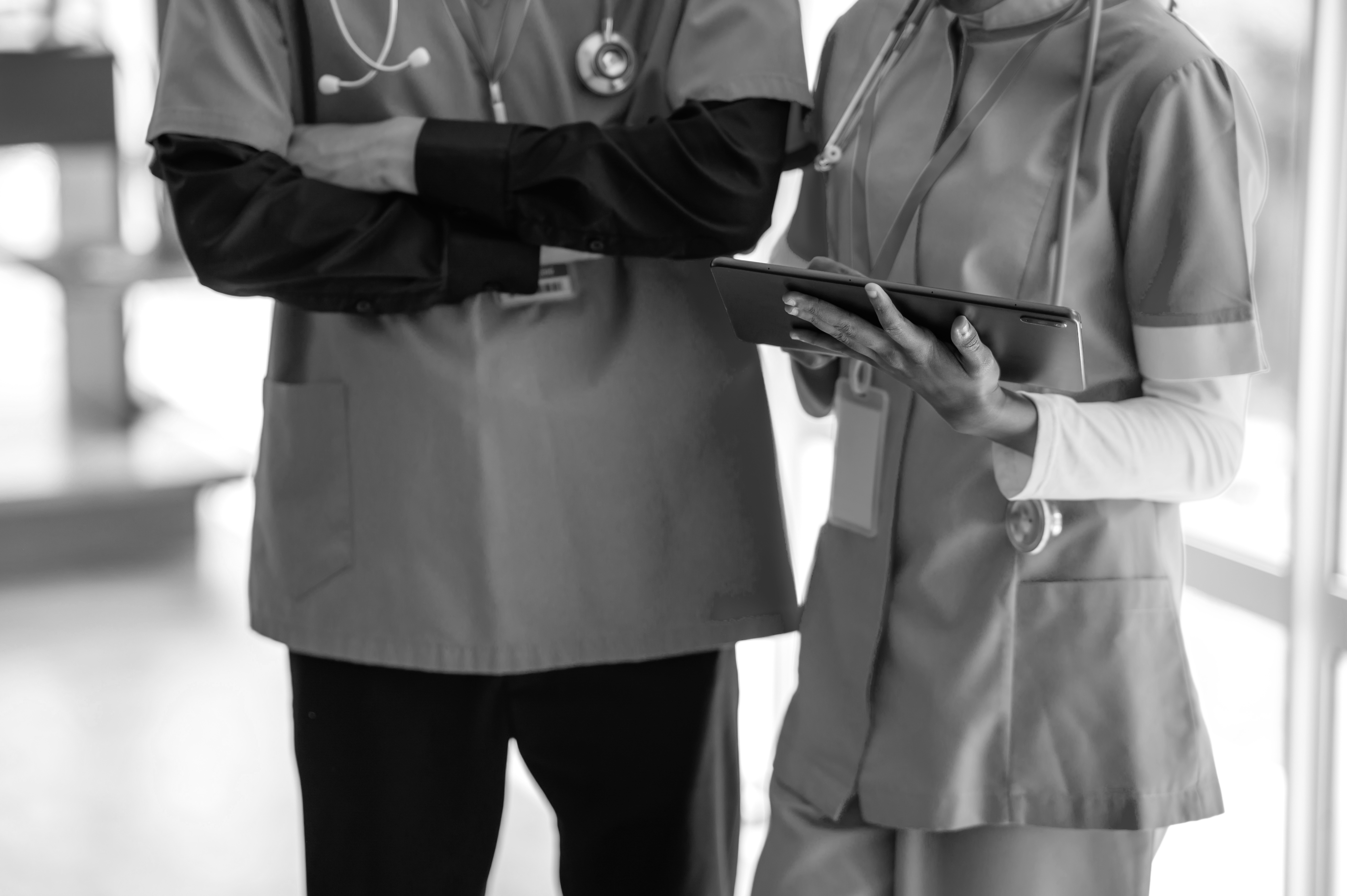 SINGLE-IMAGE_two-nurses-checking-tablet-data_aug25