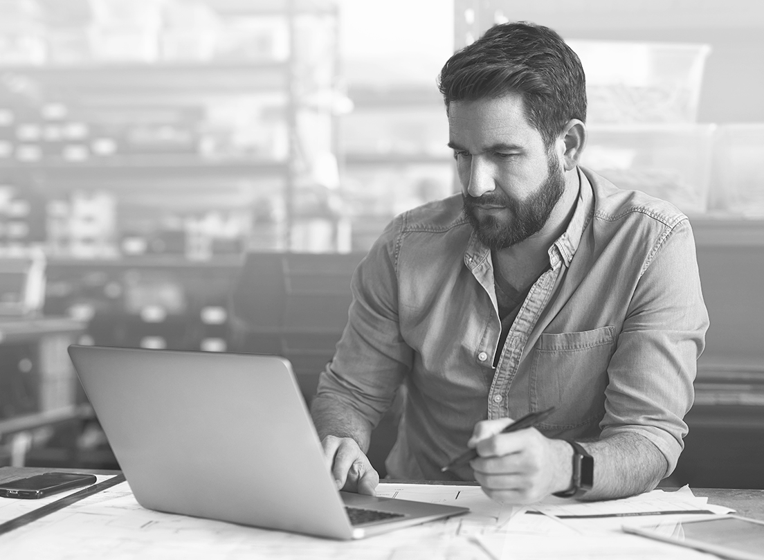 SINGLE-IMAGE_planning-architect-manager-with-laptop_may25