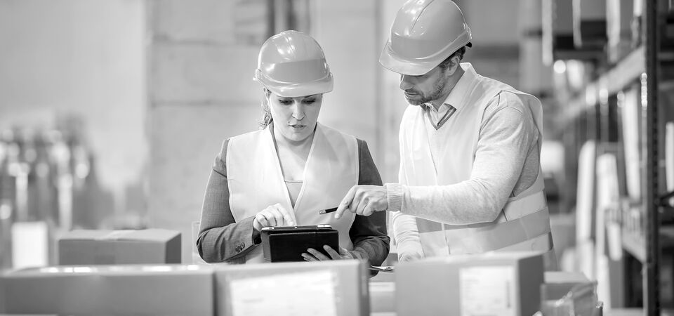 SINGLE-IMAGE_warehouse-employees-doing-inventory-check-in-tablet_aug24