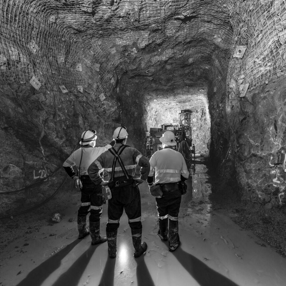 SINGLE-IMAGE_miners-standing-in-tunnel_aug25
