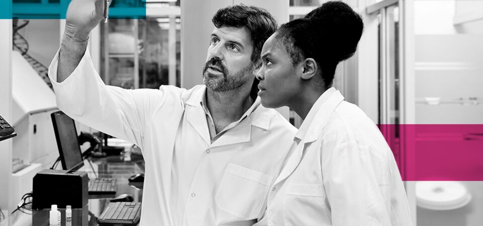 SINGLE-IMAGE_squares-male-and-female-scientist-examining _mar25