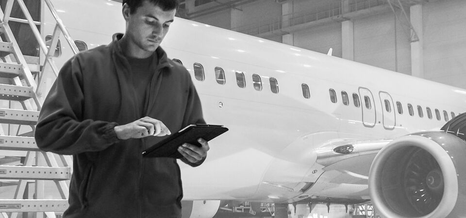 SINGLE-IMAGE_aviation-engineer-with-tablet_apr25
