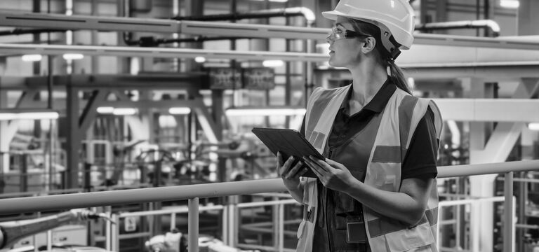 SINGLE-IMAGE_lady-with-tablet-at-manufacturing-plant-no-squares_mar24