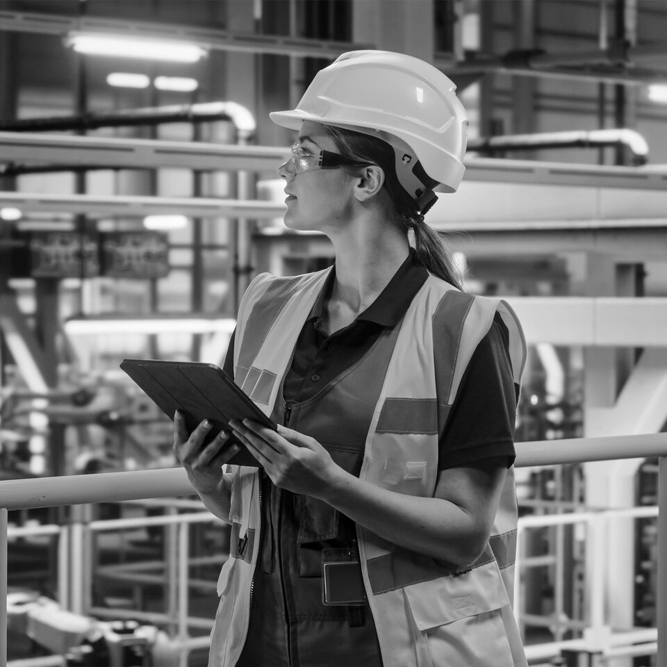 SINGLE-IMAGE_lady-with-tablet-at-manufacturing-plant-no-squares_mar24