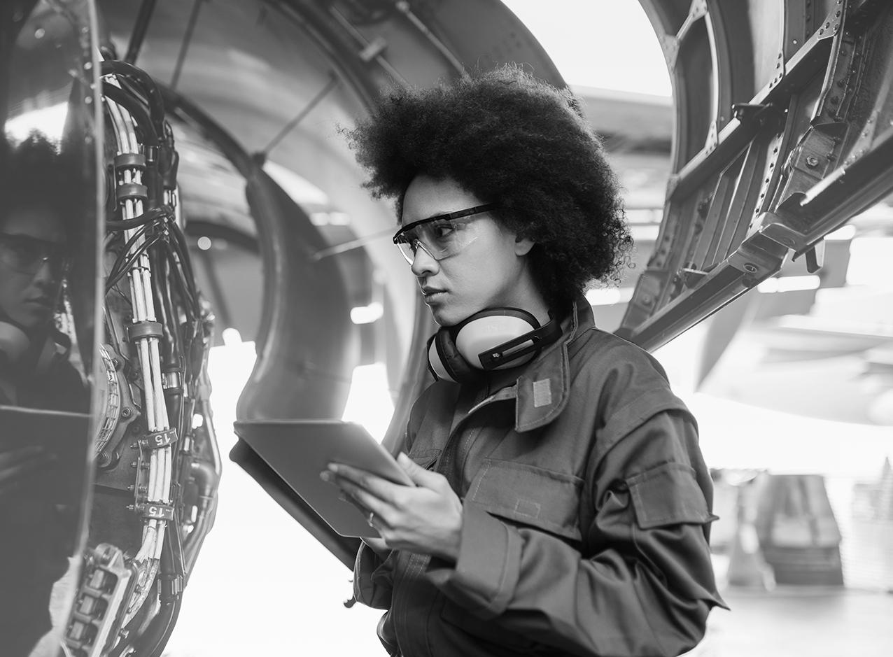 SINGLE-IMAGE_female-worker-checking-aeroplane_apr25