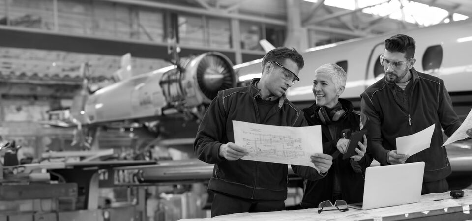 SINGLE-IMAGE_three-aviation-engineers-planning-extended_sept24