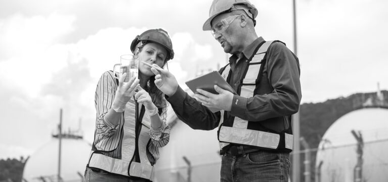 SINGLE-IMAGE_two-inspectors-check-waste-water_aug25